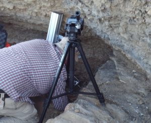 John Holt applying SPLIT on a big sandstone boulder and me observing.